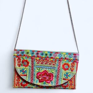 Beautiful multicolored embroidered crossbody purse/ clutch in perfect condition
